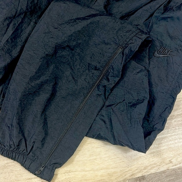 Vintage Nike Black Embroidered Logo Zippered Leg Nylon Windbreaker Track Pants S - Picture 2 of 8
